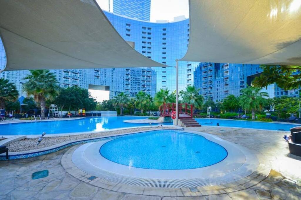 Apartament Cozy 1BR in Iconic Tower Abu Zabi Zewnętrze zdjęcie